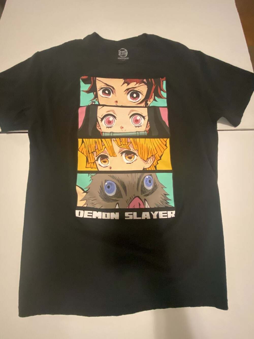 Demon Slayer Group Eyes 4-Panel Black T-Shirt